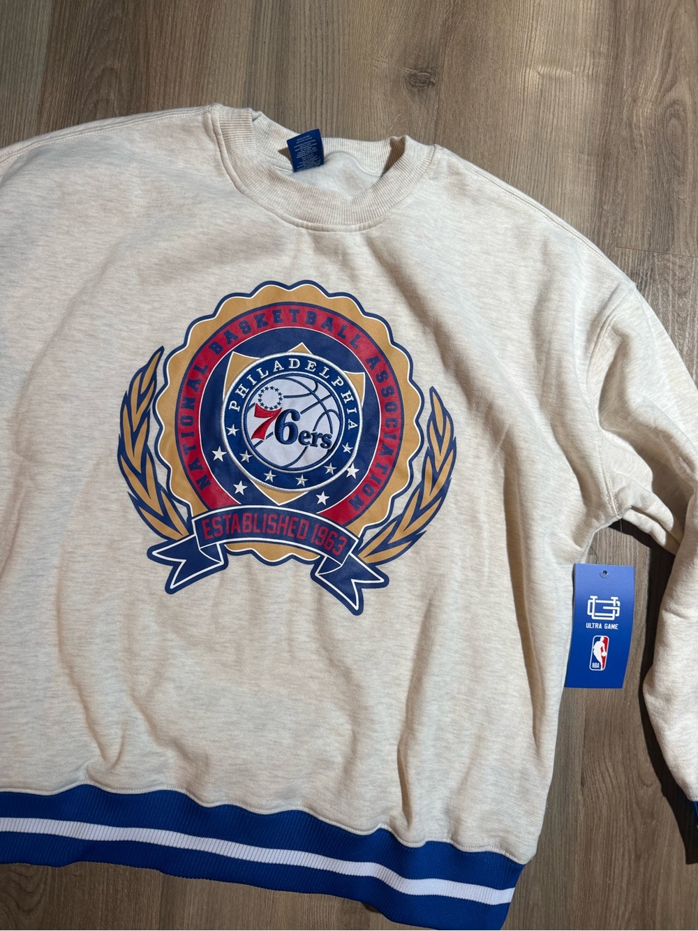 Philadelphia 76ers Crest Sweatshirt in Cream and Blue